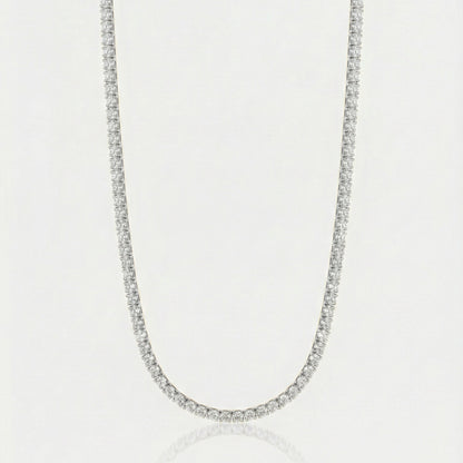 Diamond necklace on a light gray background
