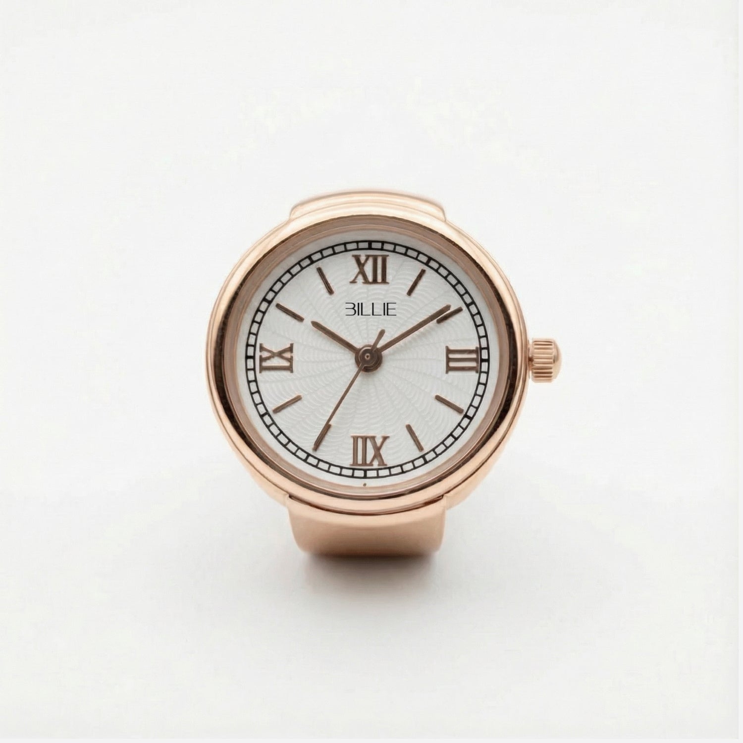 Rose gold watch with white face and Roman numerals on a light gray background