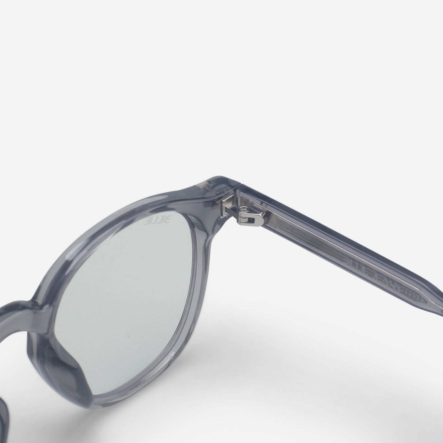 Close-up of a pair of Blue light glasses with a clear frame on a white background