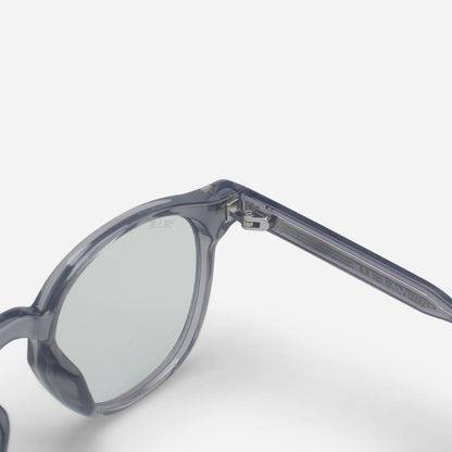 Close-up of a pair of Blue light glasses with a clear frame on a white background