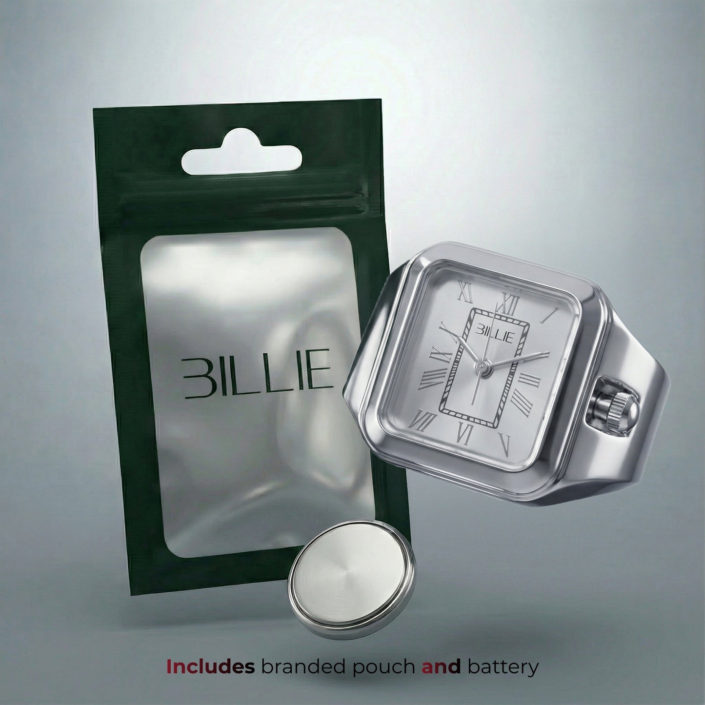 Silberne Uhr mit „BILLY”-Logo und Markenbeutel auf grauem Hintergrund