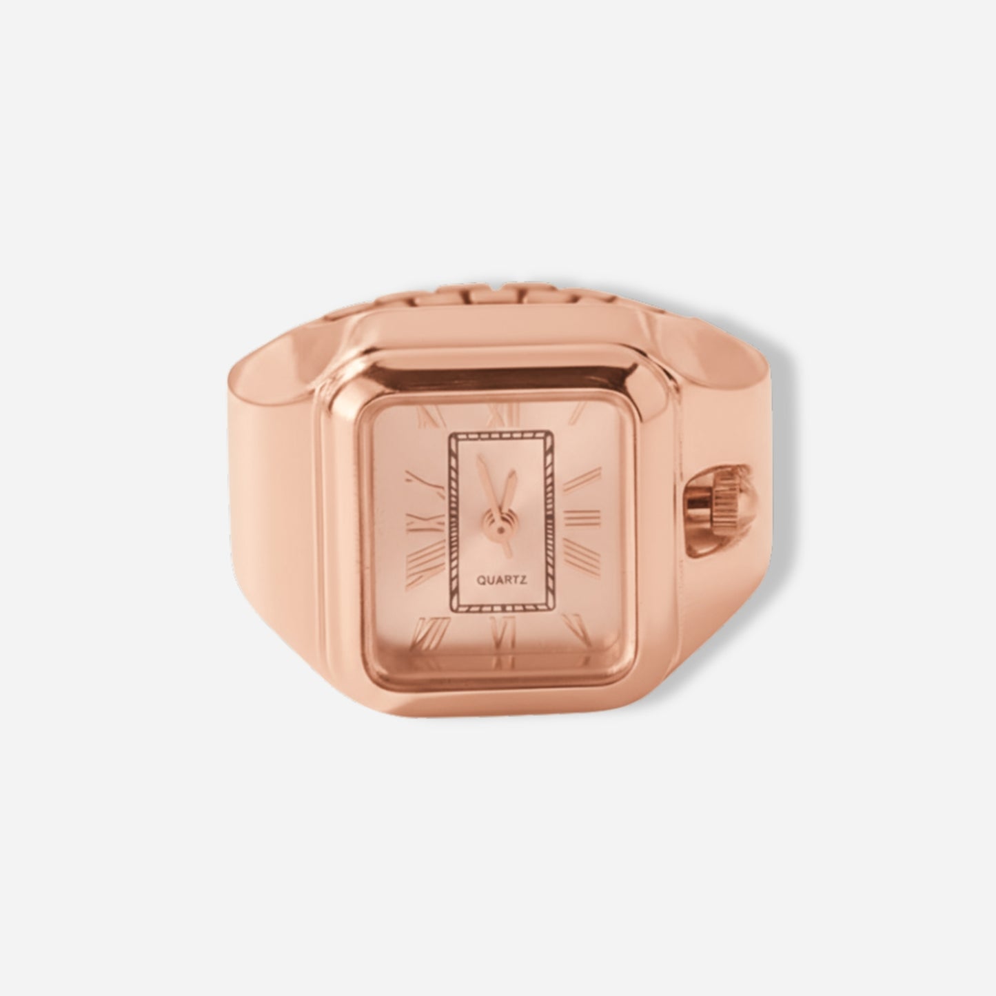 Rose gold ring watch on a light gray background