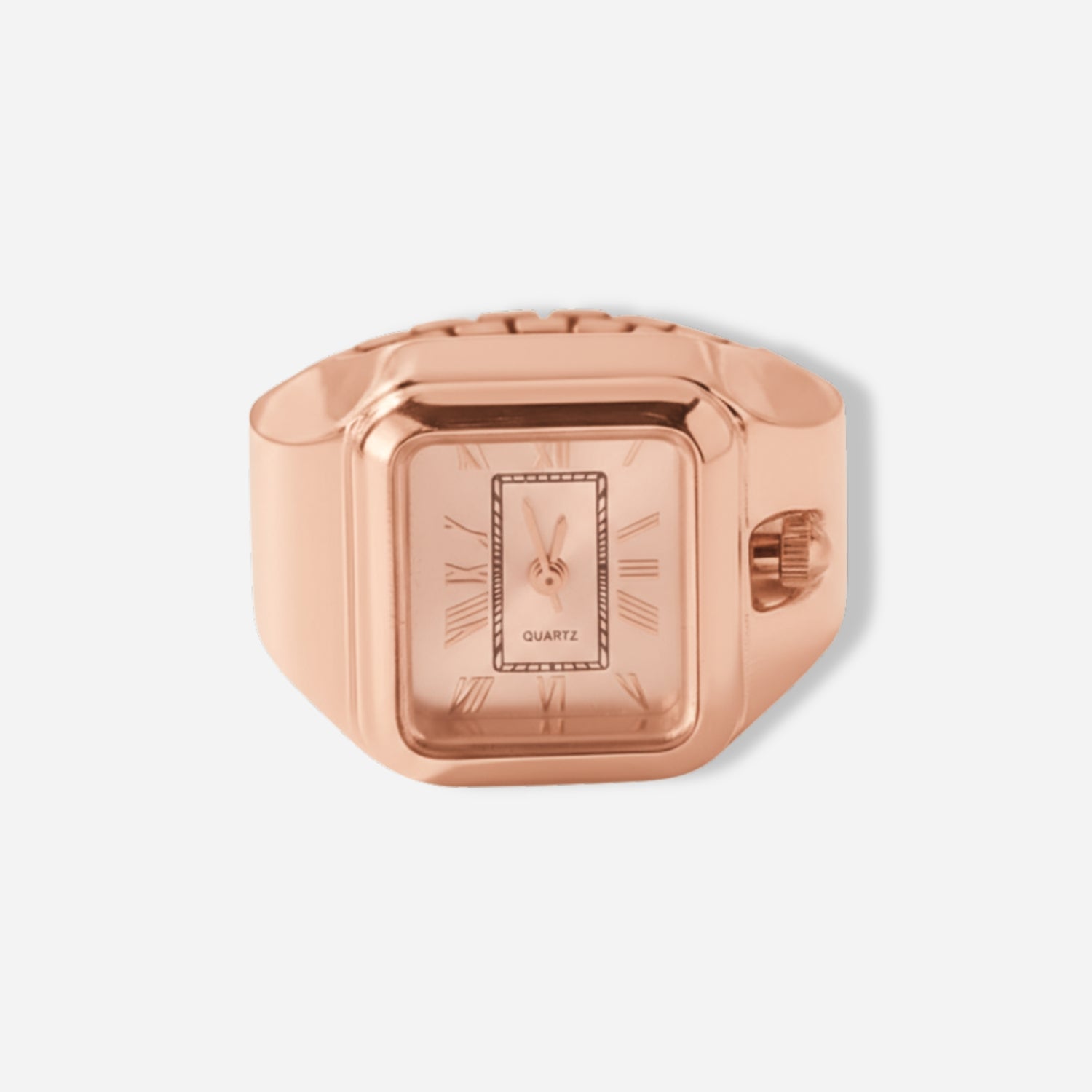 Rose gold ring watch on a light gray background