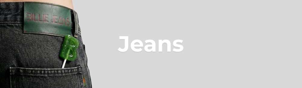 Close-up of jeans with a green belt and 'Dillie Jeans' branding on a gray background.