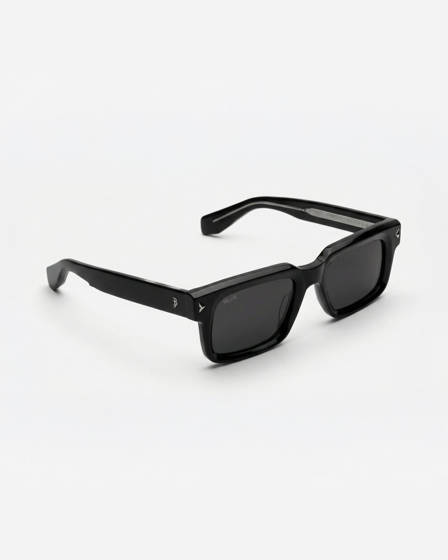 Black sunglasses with square frames on a plain background