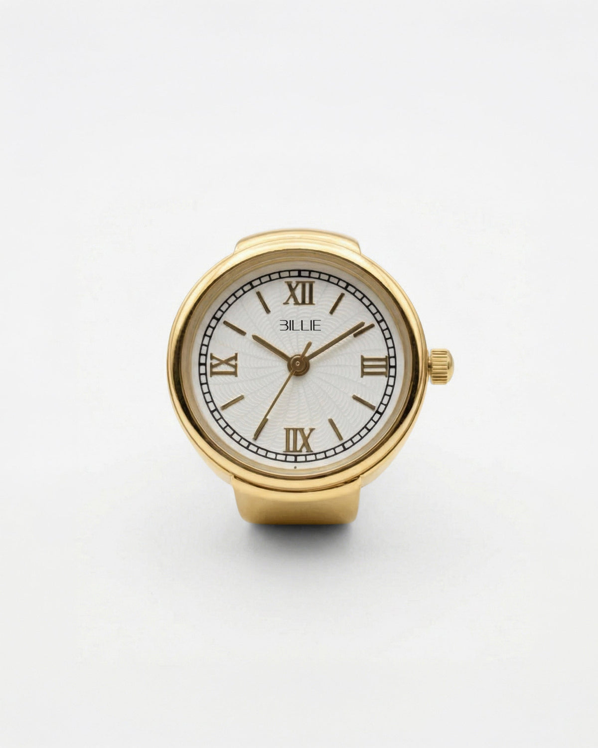 Billie Grace Ring Watch in gold, round finger watch with Roman numerals and white dial on a light background