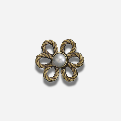 Antique gold pearl waist knot on a light gray background