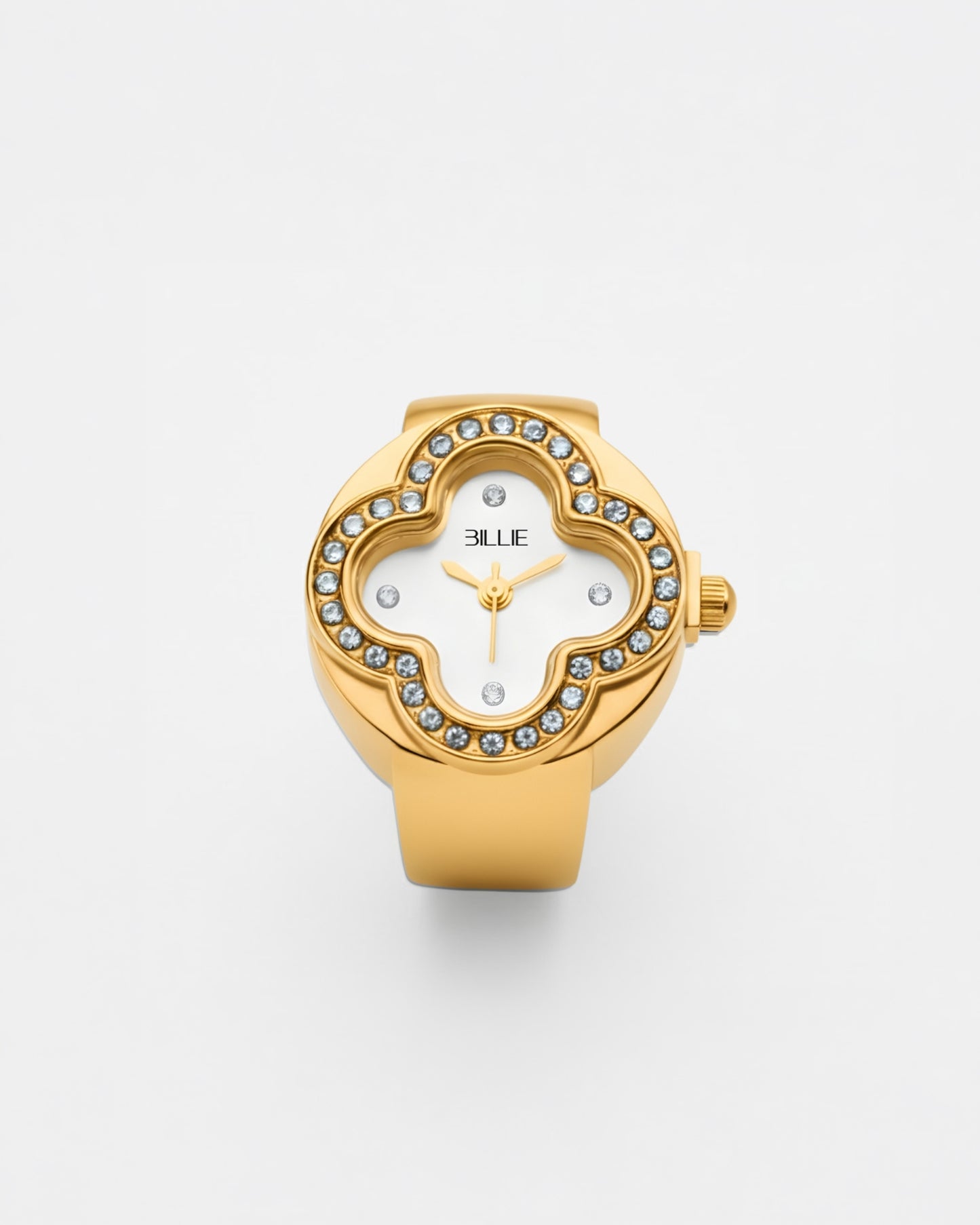 Gold watch with a white face and crystal accents on a plain background.
