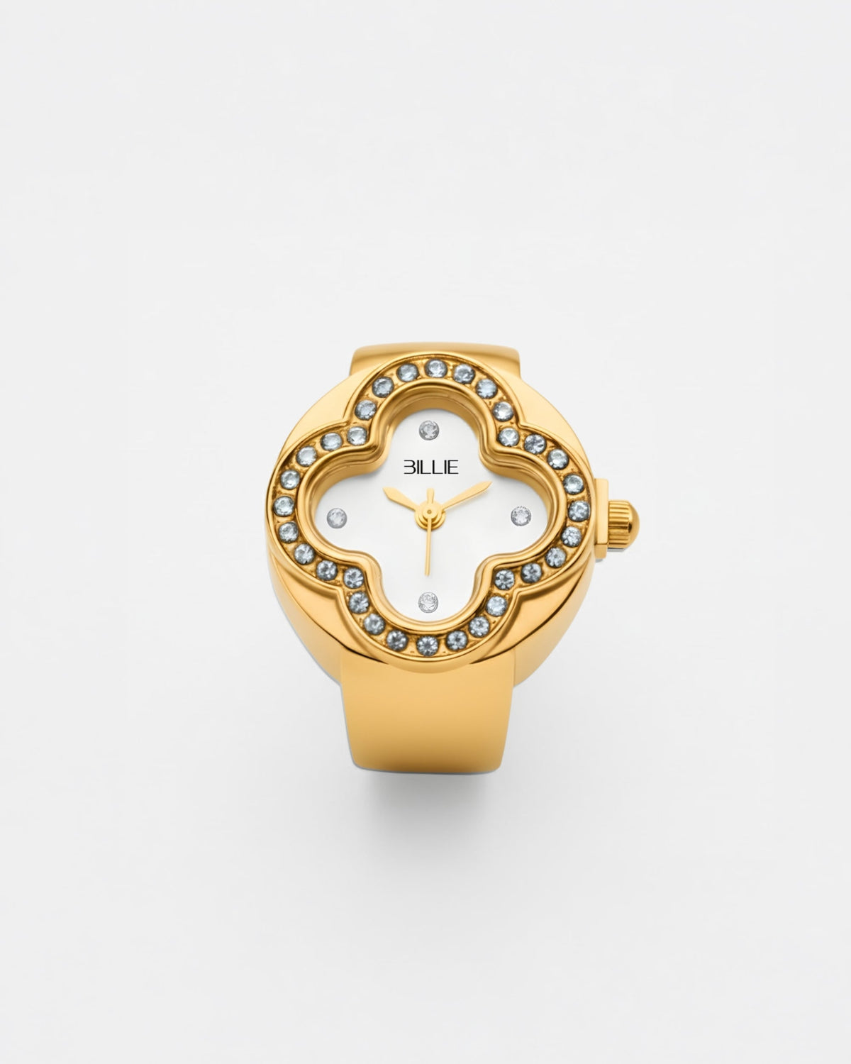 Billie Clover Ring Watch in gold, clover-shaped finger watch with crystal bezel and white dial on a light background