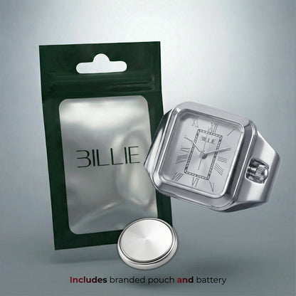Silver watch with branded 'BILLY' packaging on a gray background