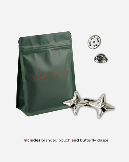 Green pouch with silver star clasps and buttons on a plain background