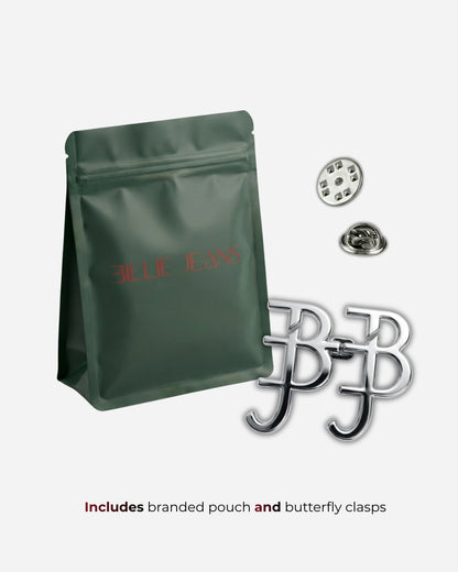 Green pouch with silver clasps and buttons on a plain background.