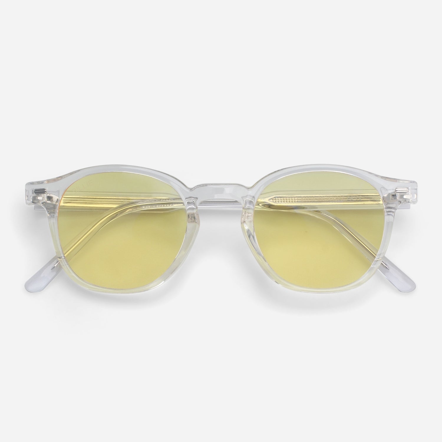 Clear frame Blue light glasses with yellow lenses on a white background