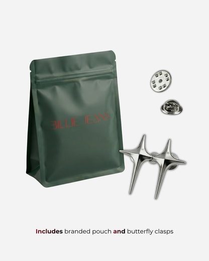 Green pouch with silver clasps and buttons, text visible on pouch.