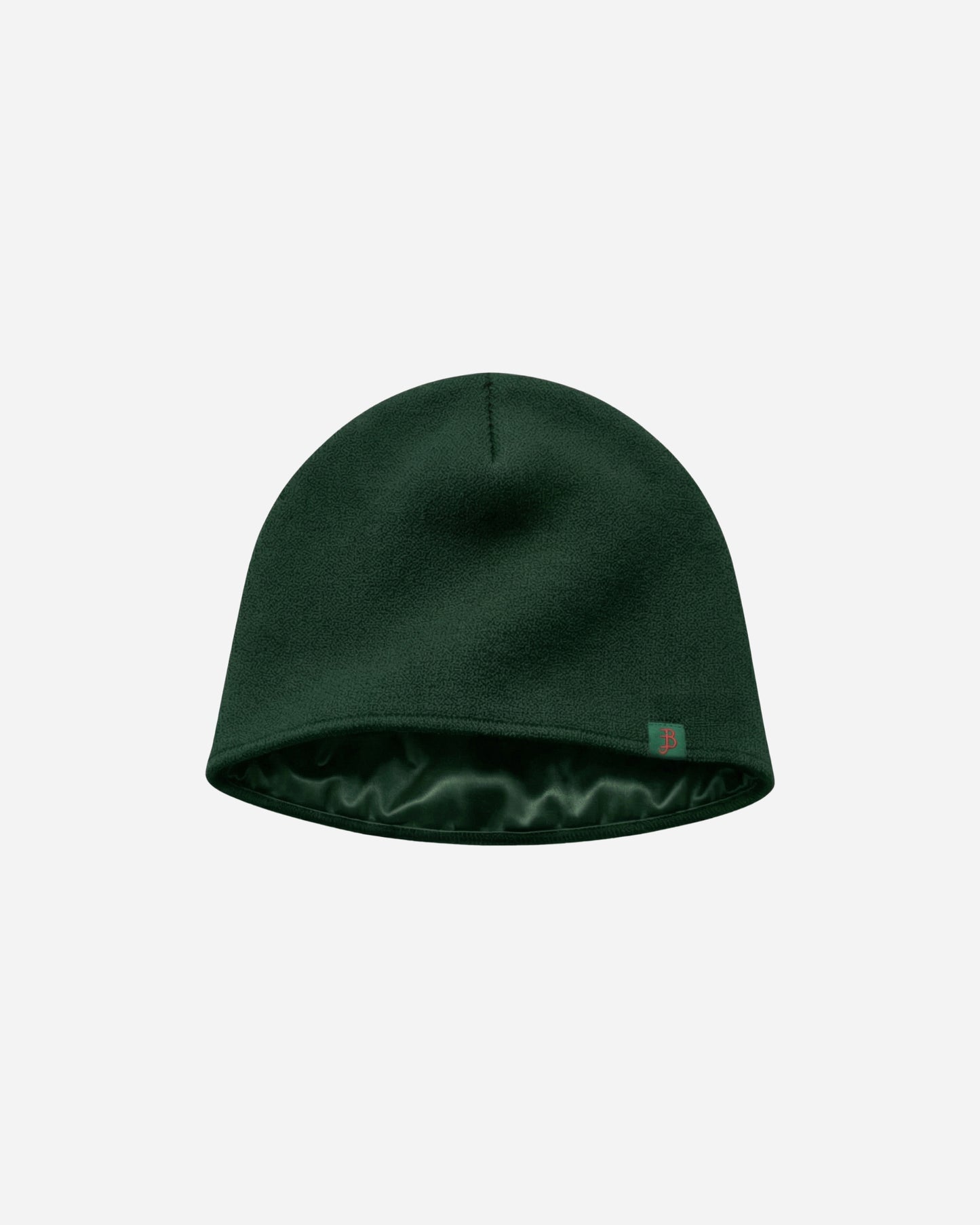 Green beanie hat on a plain background