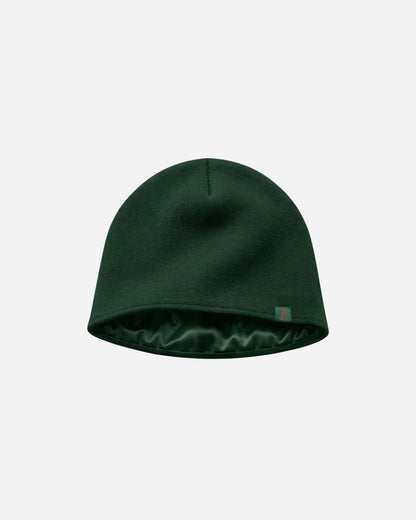 Green beanie hat on a plain background