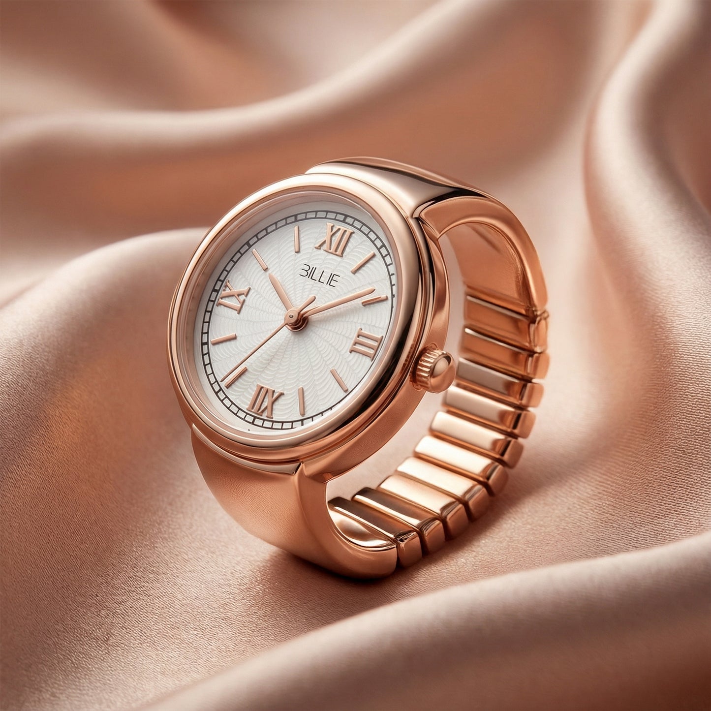 Rose gold watch with white dial on a soft pink fabric background