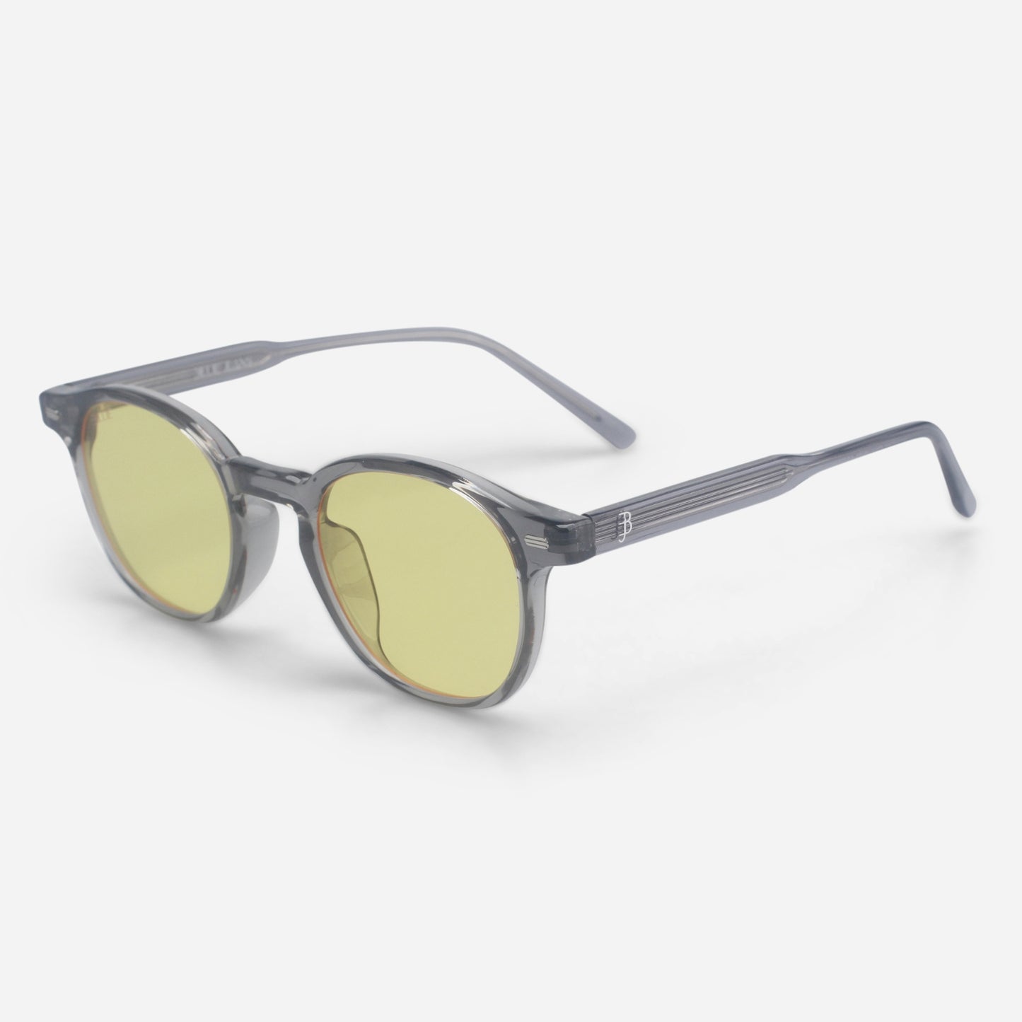 Round sunglasses with yellow lenses and gray frame on a white background