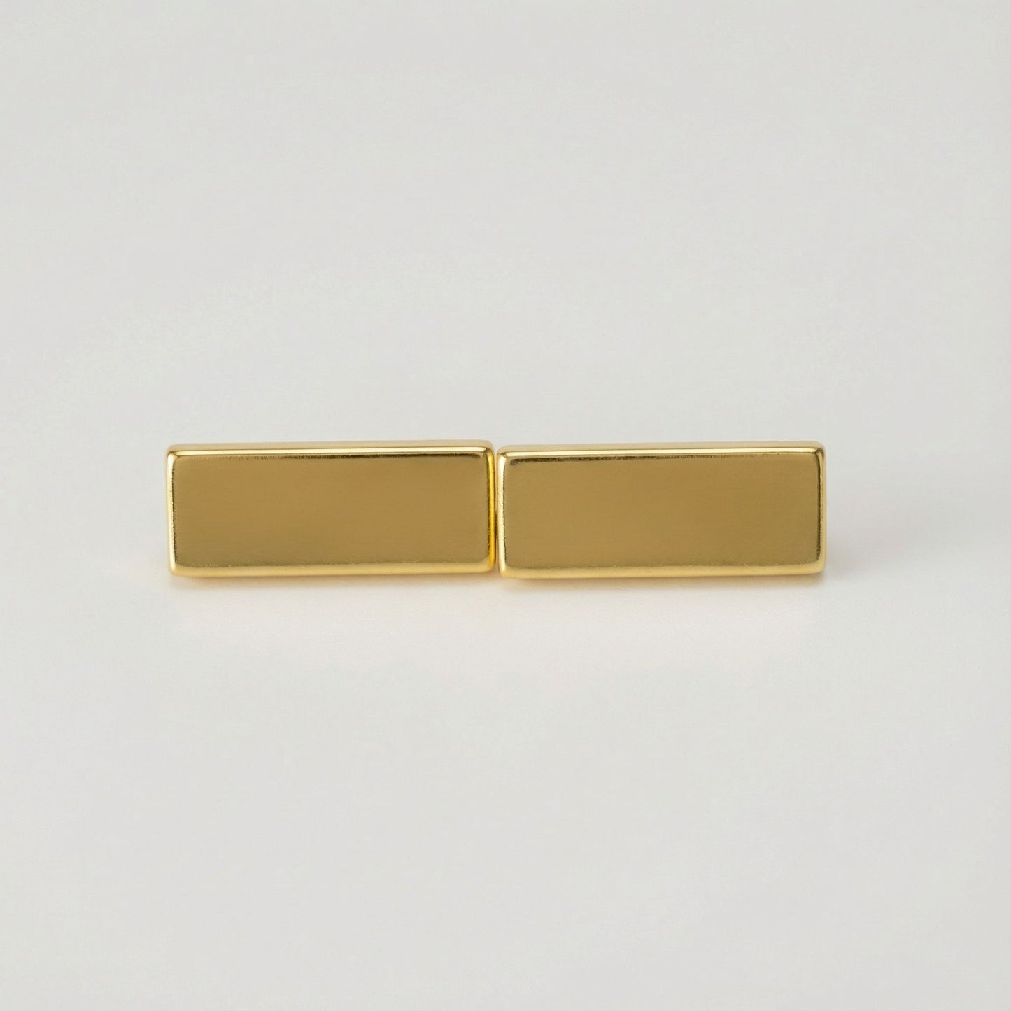 Gold rectangular bar on a light gray background