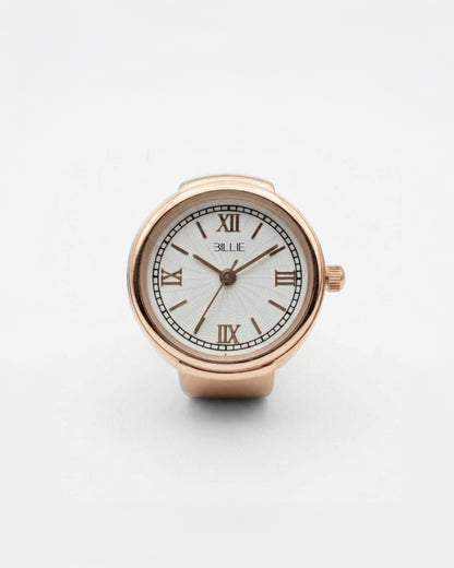 Rose gold watch with white face and Roman numerals on a plain background