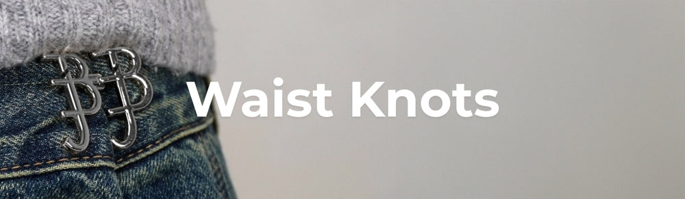 Close-up of a waistband with metal buttons and text 'Waist Knots' on a gray background.