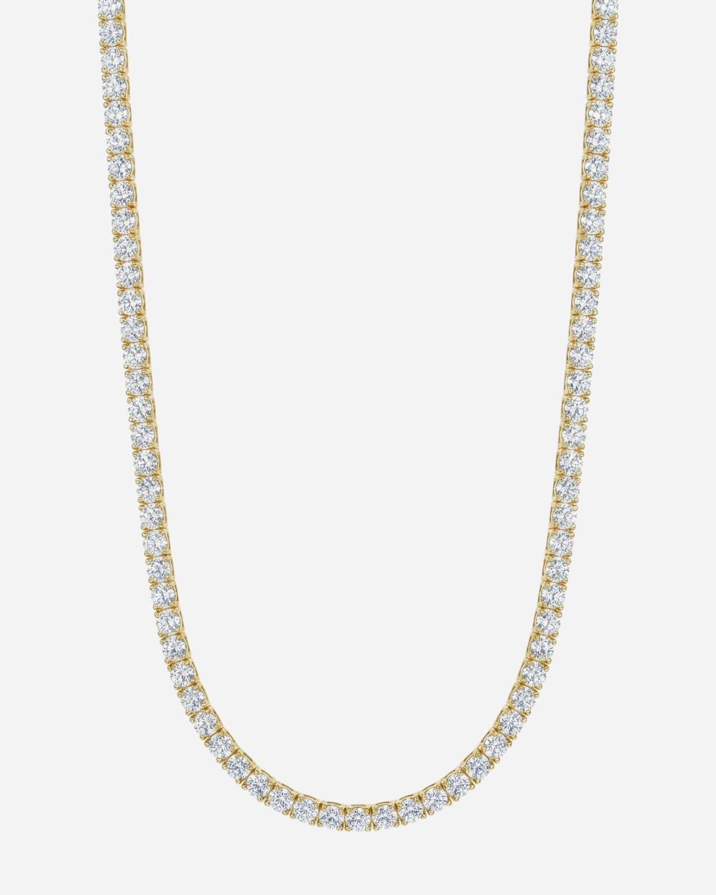 Gold chain necklace with clear stones on a plain white background