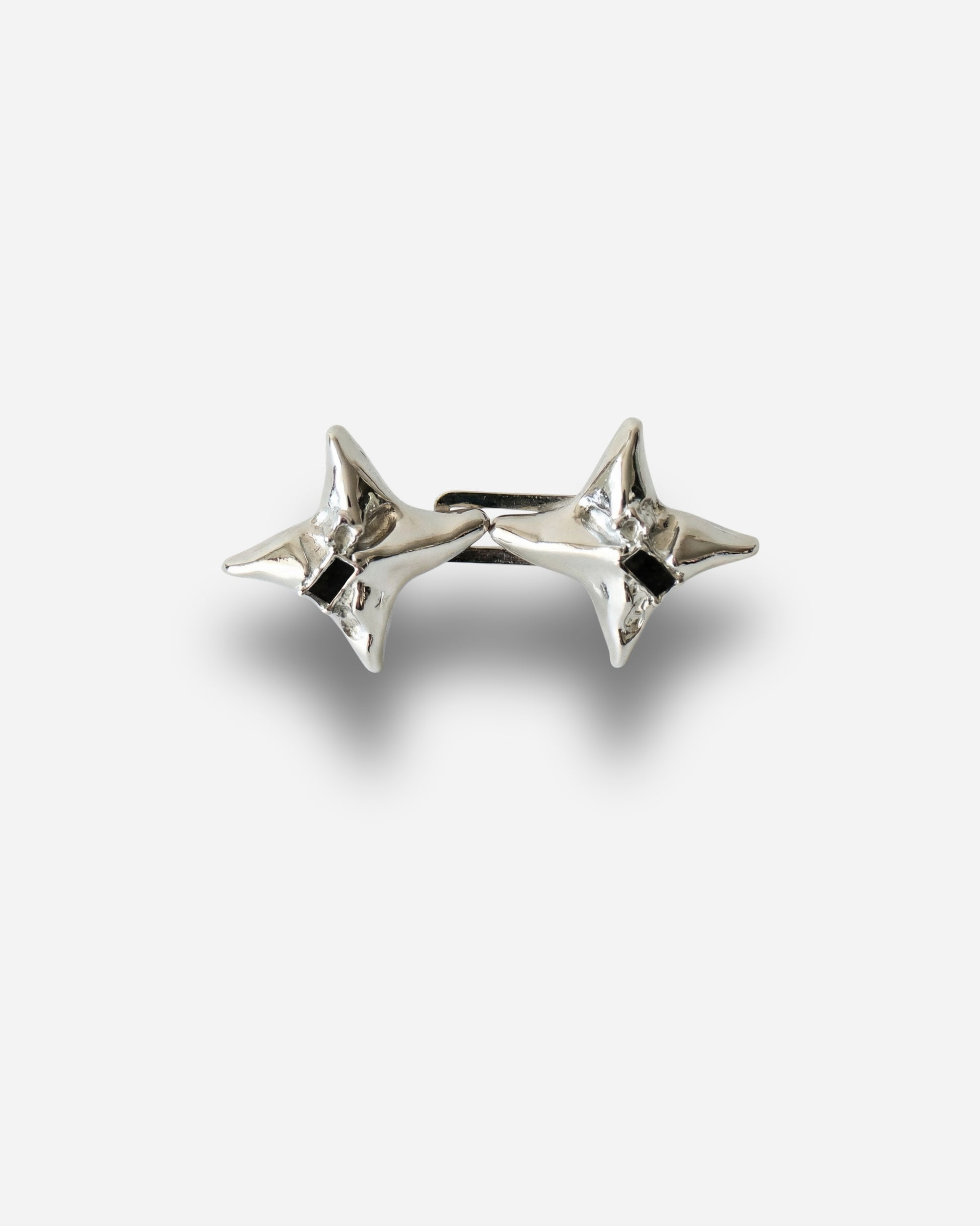 Silver star-shaped earrings with a shiny finish.