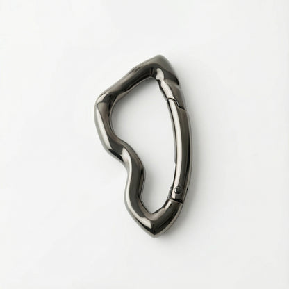Metallic carabiner on a white background