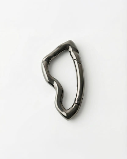 Billie Carabiner Keychain in gunmetal black, wavy carabiner clip on a light background