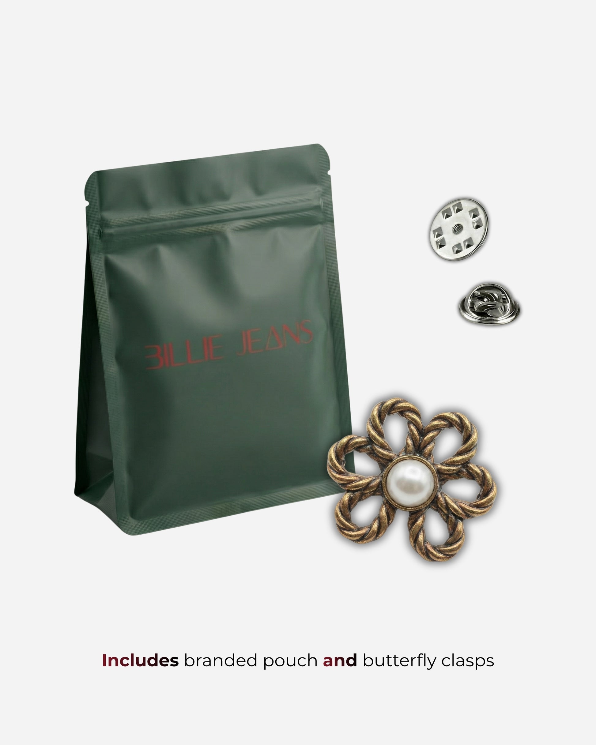 Green pouch with red text, flower brooch with pearl, and two butterfly clasps.