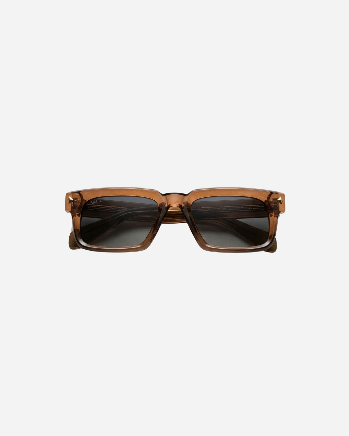 Brown sunglasses with dark lenses on a plain background