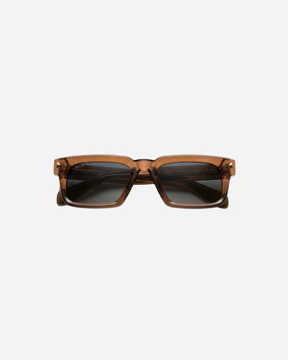 Brown sunglasses with dark lenses on a plain background