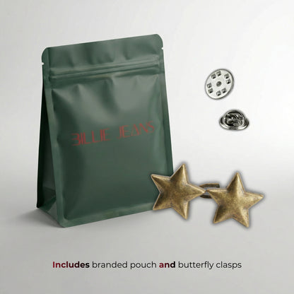 Green branded pouch with star-shaped earrings and butterfly clasps on a light gray background