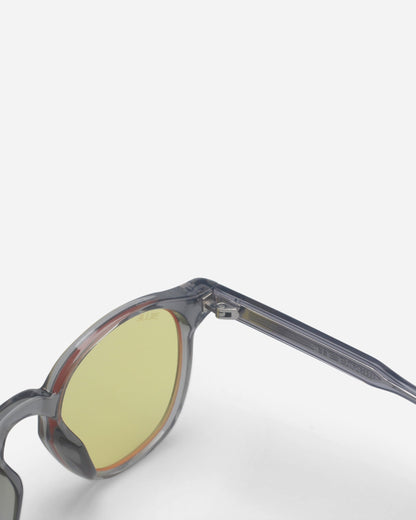 Close-up of the gray frame and yellow lens of the Billie Blue Light Glasses