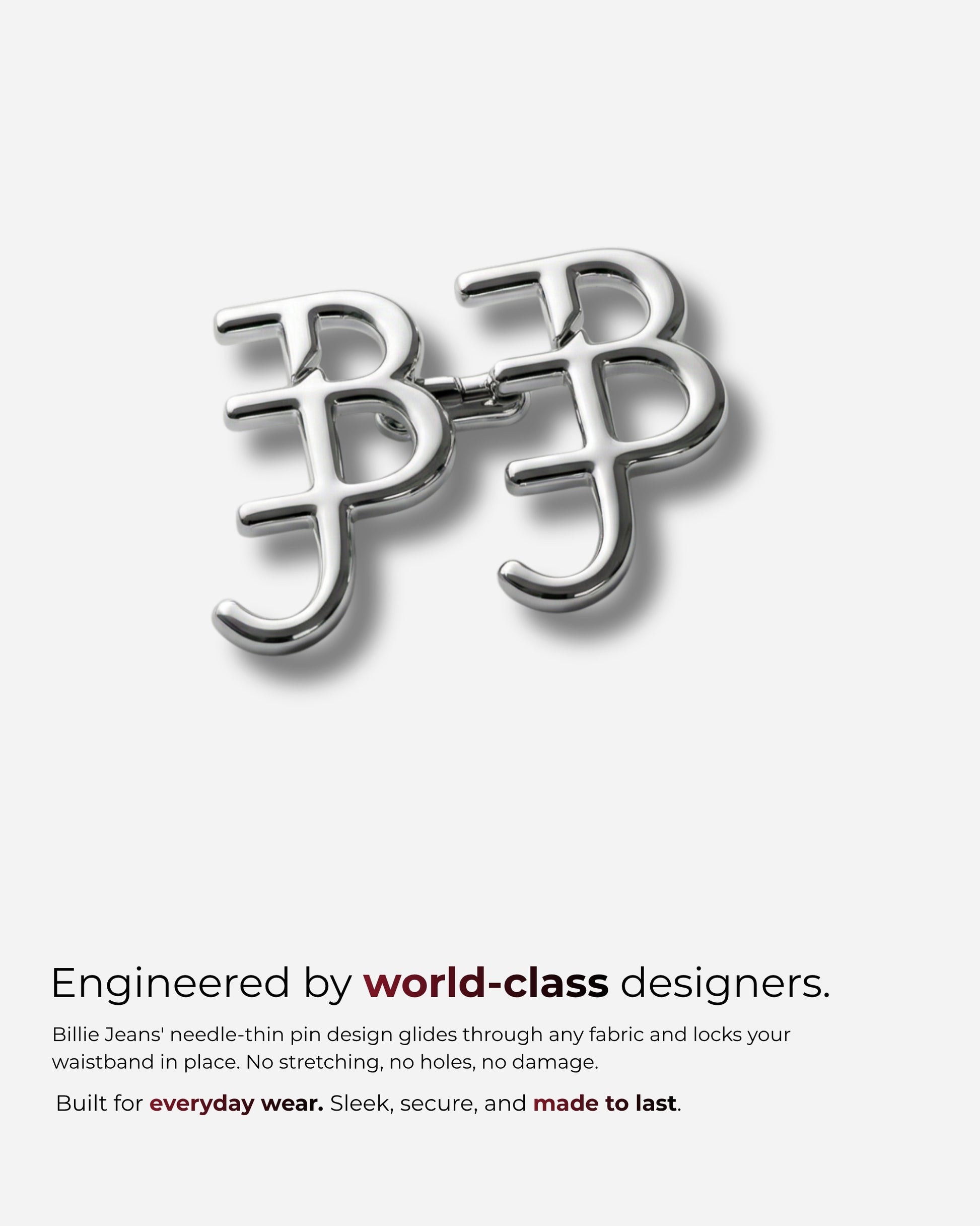 Silver pin design with interlocking letters on a plain background.