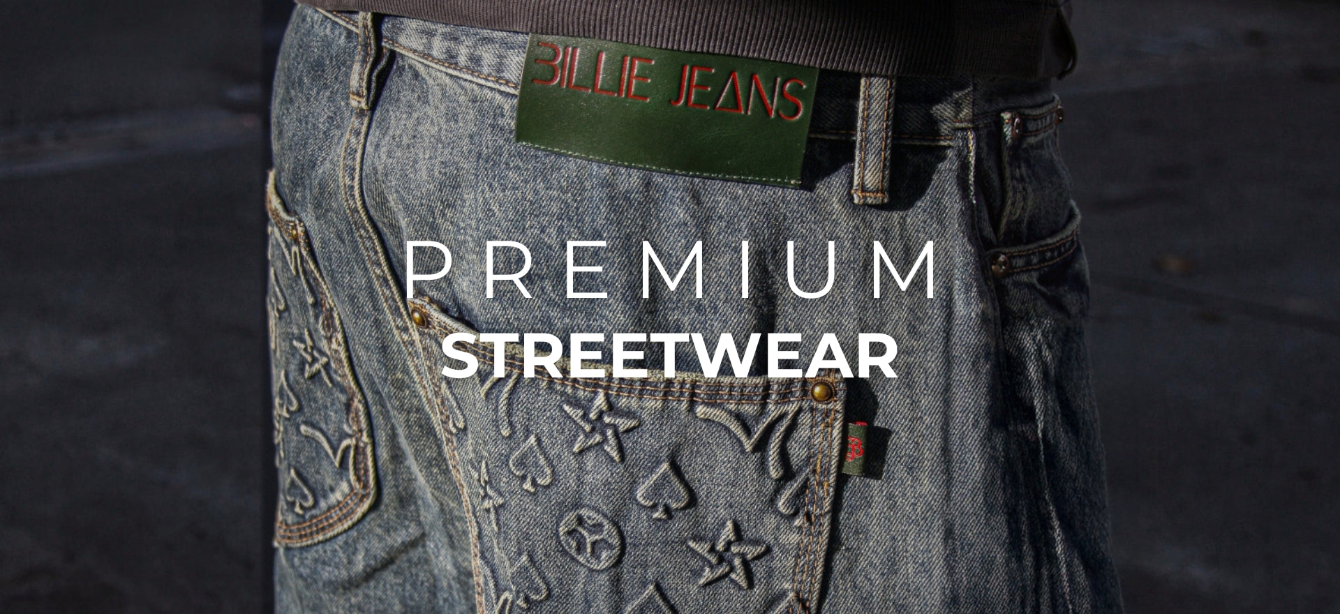 Blue jeans with a brand tag and text 'Premium Streetwear' on a dark background