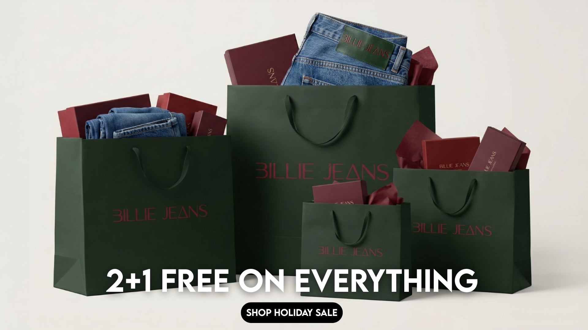 Green 'Billie Jeans' shopping bags filled with jeans and denim items on a white background.