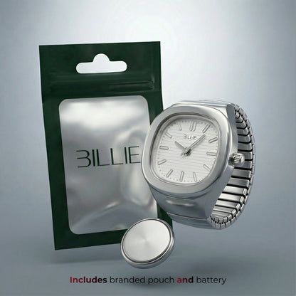 Silver watch with branded pouch and battery on a gray background