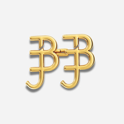 Gold waist knots with 'BJ' initials on a light gray background